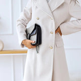 Liva | Double-breasted wool coat for women 7