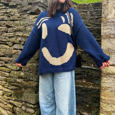 Oversized sweaters with smiley face design 0