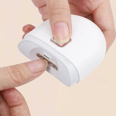 Electric Nail Clipper With Rechargeable Night Light And Shavings Catcher - Image 1
