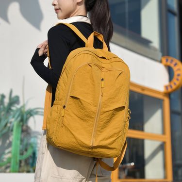 Multifunctional Travel Backpack with Streamlined Everyday Design and Zippered Front - Image 2