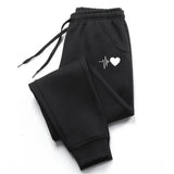 Women's Fitness Joggers With Adjustable Waistband And Side Pockets - Image 2