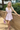 Chic Baby Pink Mini Dress with Crystal Button Details and Pockets – Ribbed Texture, Versatile for Casual and Formal Occasions 3