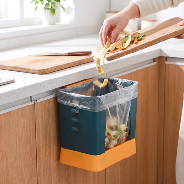 Kitchen Trash Holder With Wall-Mounted Design For Under-Cabinet Use Blue And Orange Plastic Bin With Adjustable Fit - in-use