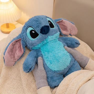 Plush Hot Water Bottle With Stitch Design Provides Comforting Warmth For Cold Fingers - in-use