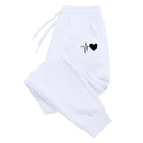 Women's Fitness Joggers With Adjustable Waistband And Side Pockets - Image 1