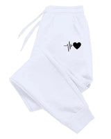 Women's Fitness Joggers With Adjustable Waistband And Side Pockets - Image 1