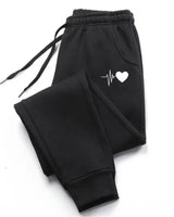 Women's Fitness Joggers With Adjustable Waistband And Side Pockets - Image 2